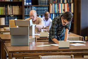 Working at the archives at Bird Library.